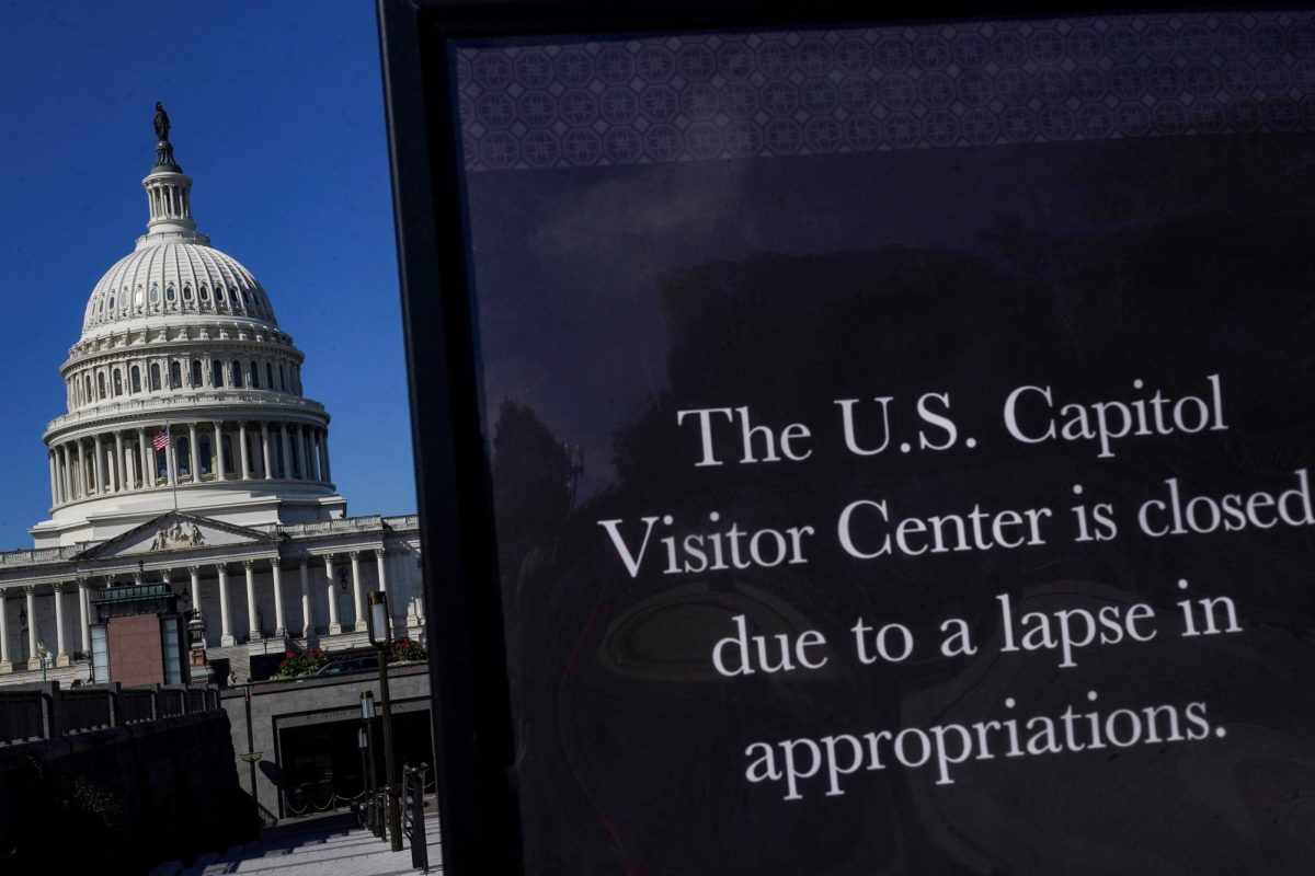 A view of a sign warning that the U.S. Capitol Visitor Center is closed, with the U.S. Capitol dome visible in the background, on the first day of a partial government shutdown, in Washington, D.C., U.S., October 1, 2025. REUTERS/Nathan Howard