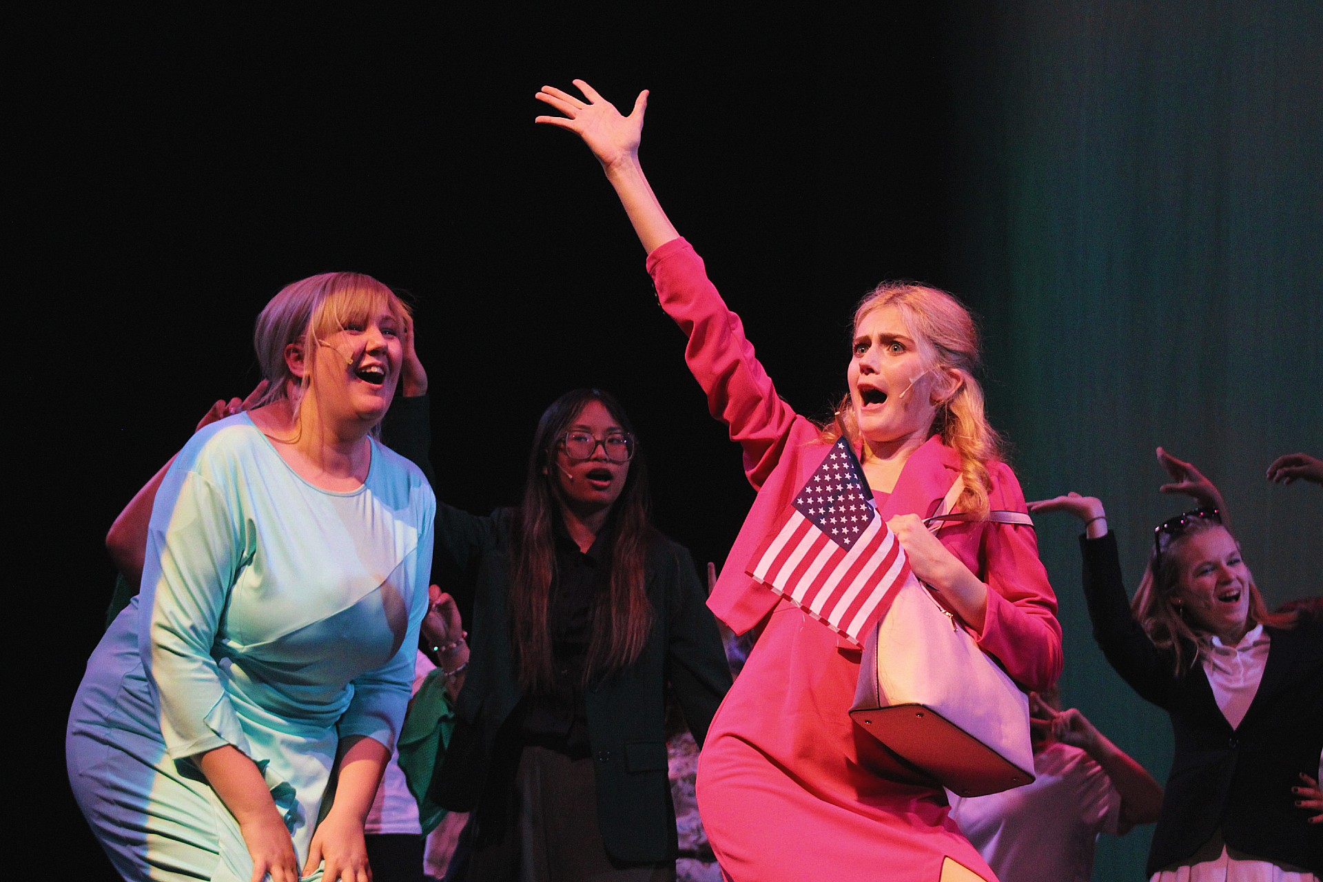Junior Ellison Kitchell, playing Elle Woods, celebrates while performing "Legally Blonde Remix."