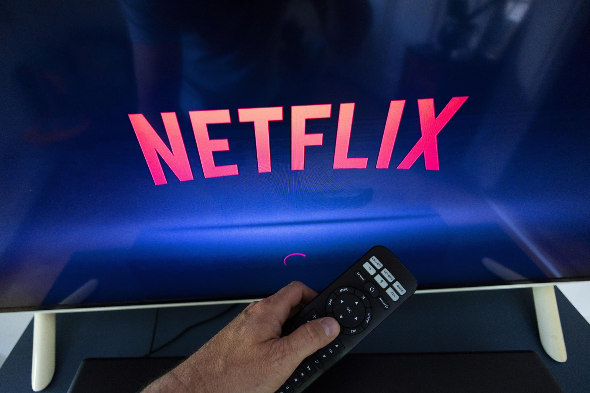 A Netflix logo is shown on a TV screen in this illustration taken May 9, 2022. REUTERS/Denis Balibouse/Illustration