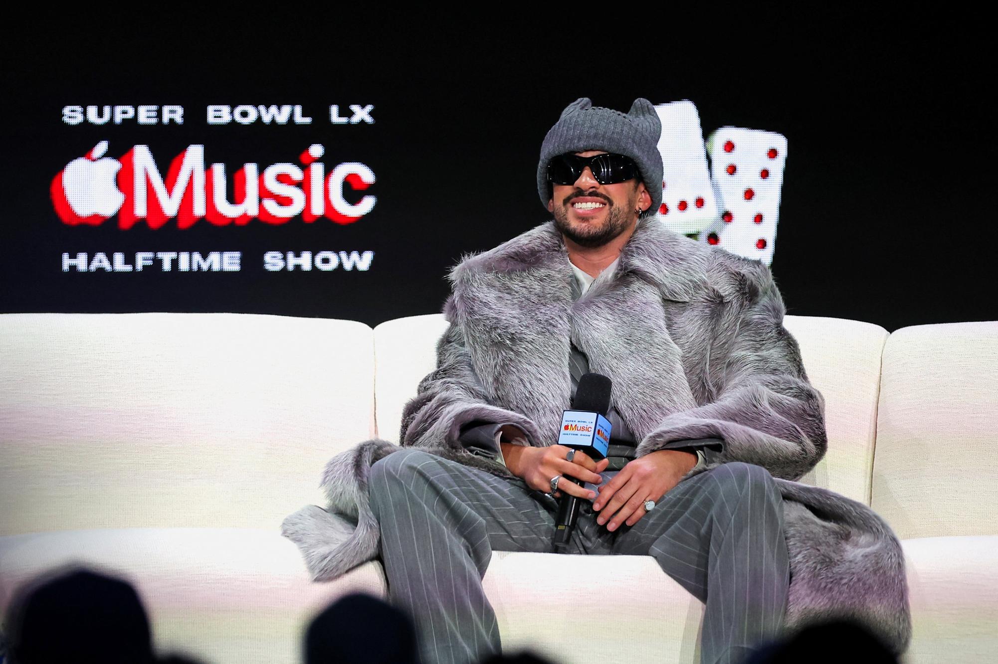 Grammy Award-winning global recording artist Bad Bunny smiles during his halftime show press conference ahead of Sunday's performance at the Super Bowl LX game between the New England Patriots and the Seattle Seahawks, in San Francisco, California, U.S., February 5, 2026. REUTERS/Carlos Barria