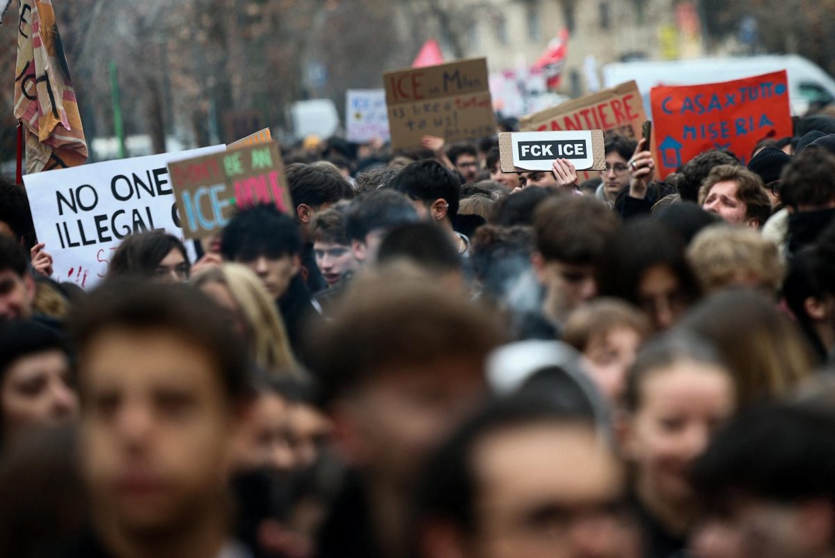 People protest against U.S. Immigration and Customs Enforcement (ICE) personnel who will help protect U.S. delegations at the Milano Cortina 2026 Winter Olympics, in Milan, Italy, February 6, 2026.    REUTERS/Guglielmo Mangiapane