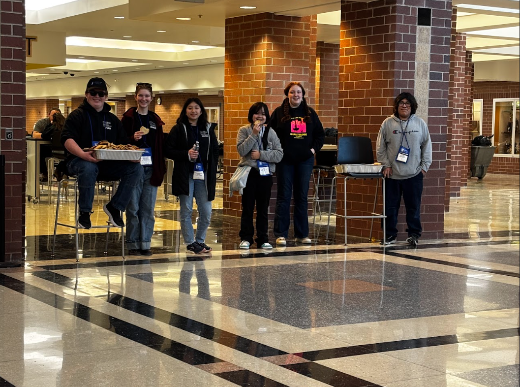 Members of the Tech Challenge teams give out cookies during the SUFFS intermission. (Courtesy of John Vales)