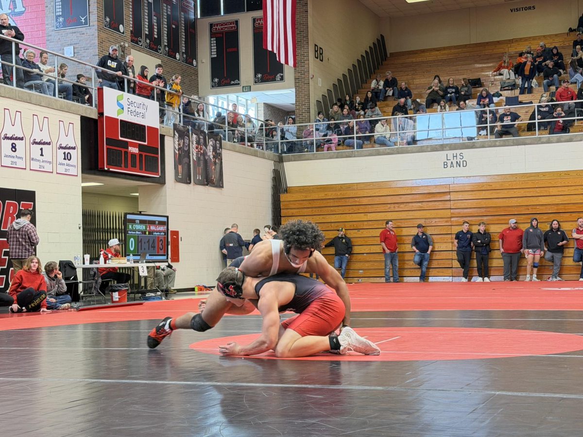 Junior Quintin McLeod wrestles his opponent at Boys Wrestling Regionals on Feb. 7, 2026.