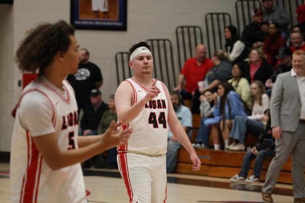 Senior Hurlee Shank calls for a ball during a pregame shoot-around on senior night.