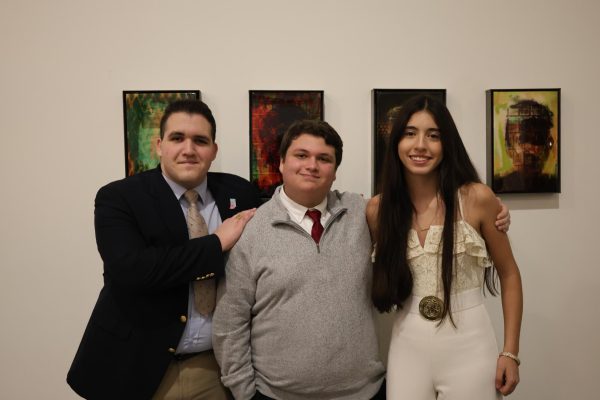 The students who spoke at the Diversity Dinner posing for a photo. From left to right junior Yoslen Santana, senior Jackson Lythgoe and senior Nathalia Hernandez.