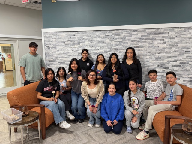 The Diversity Club takes a group picture in the waiting room of Chase Nursing Home. (Courtesy of Fatima Franco)