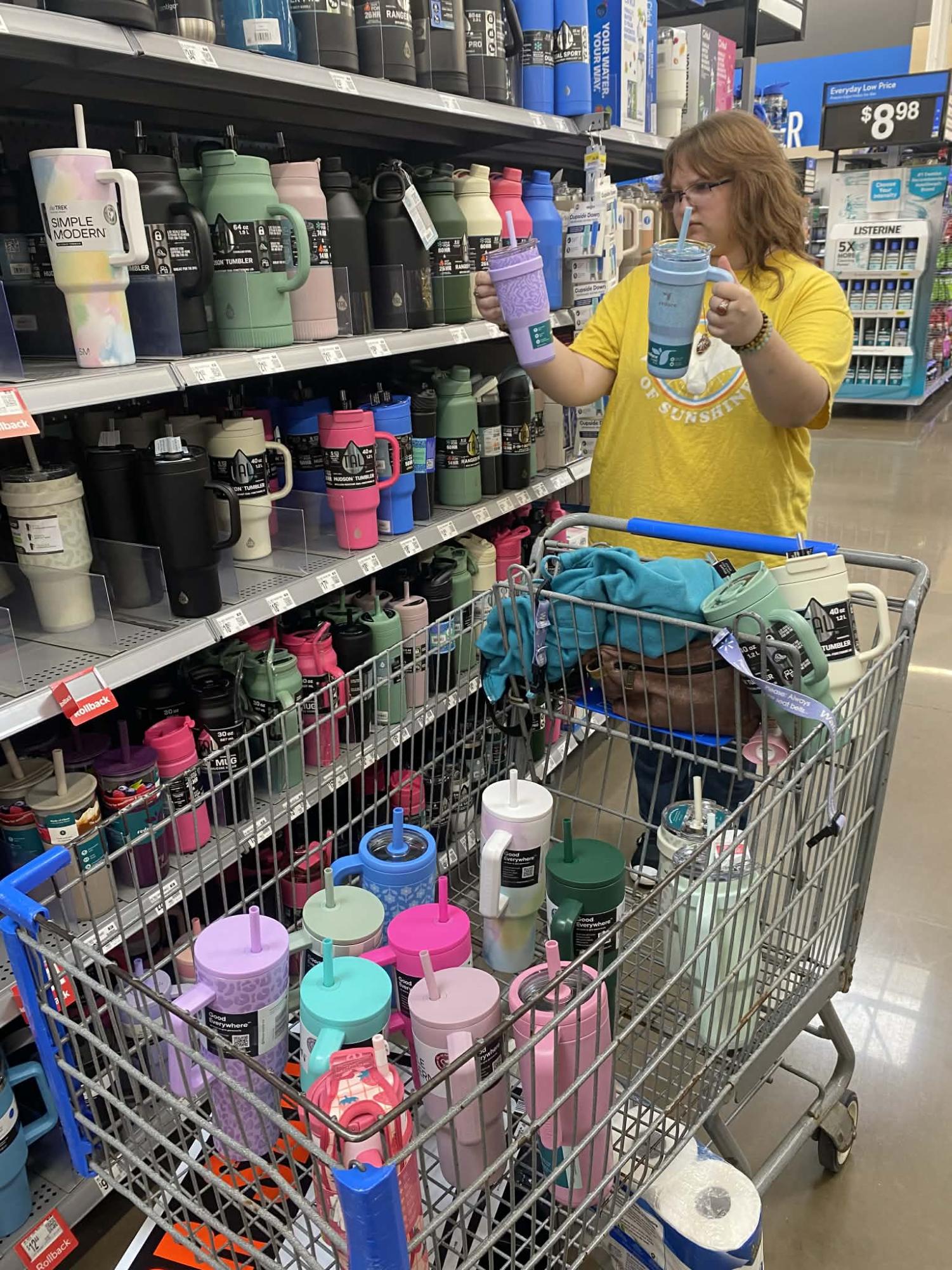 An example of a person not being able to decide between two things so they end up buying more than necessary