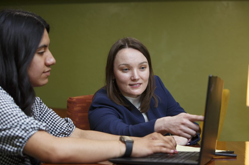 Libby Nelson works with a client. (Courtesy of Libby Nelson)