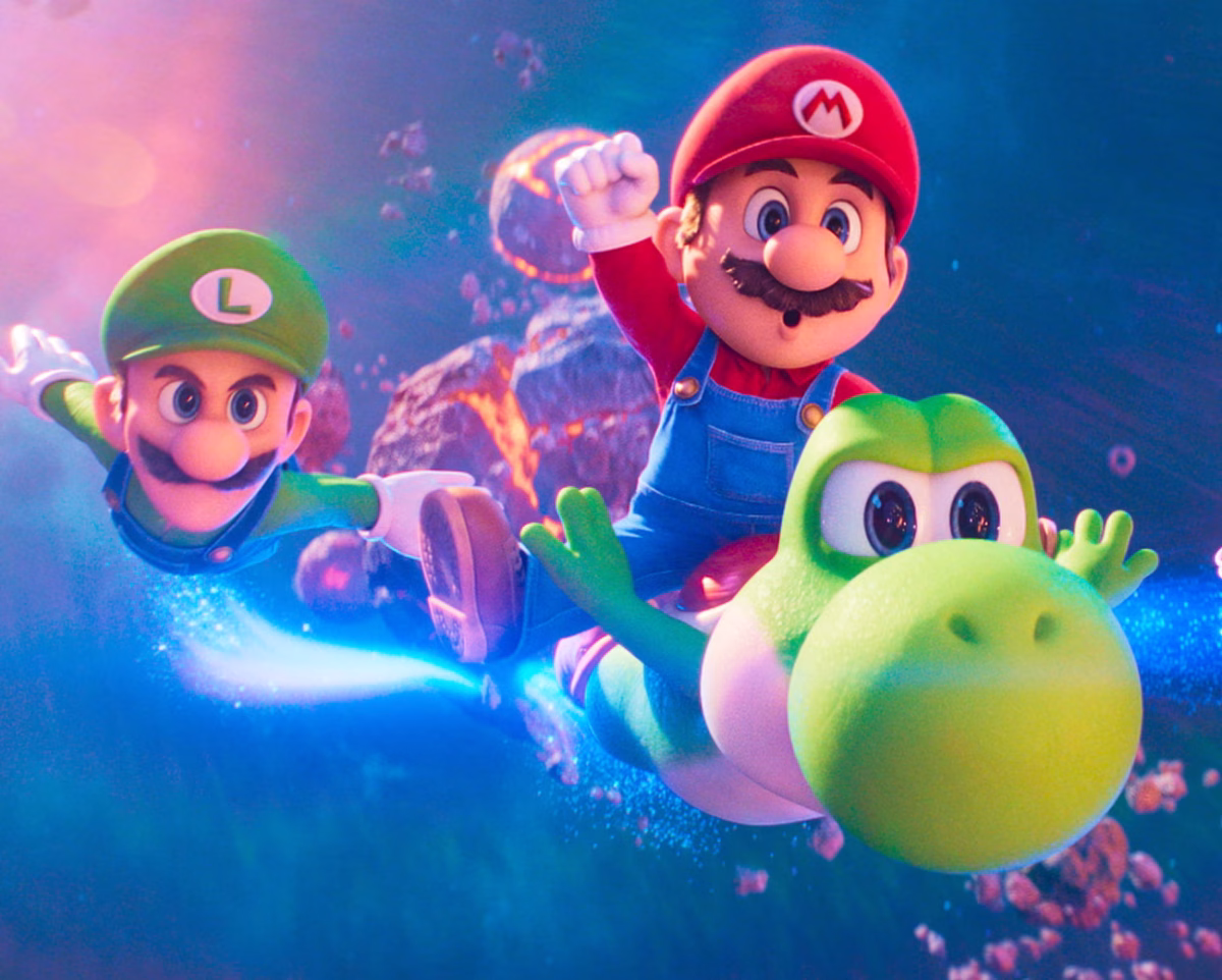 Mario, Luigi and Yoshi fly together exploring the galaxy. (Nintendo and Universal Studios/PA)