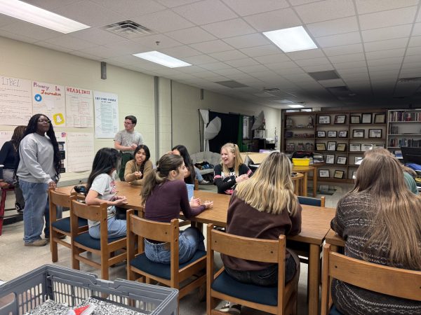 Enjoying Fun Friday, Magpie staff socializes and tries to figure out who the killer is in Mafia, a murder mystery-like game.