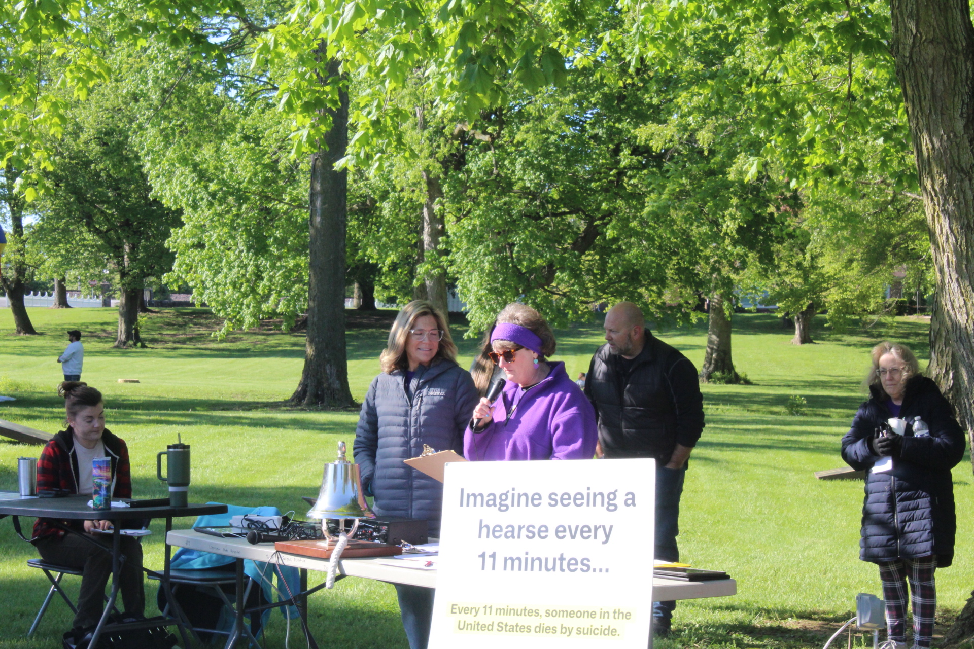 Rhonda giving a speech for the event